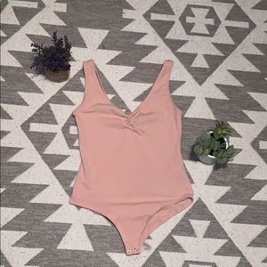 Pink ballet style onesie
